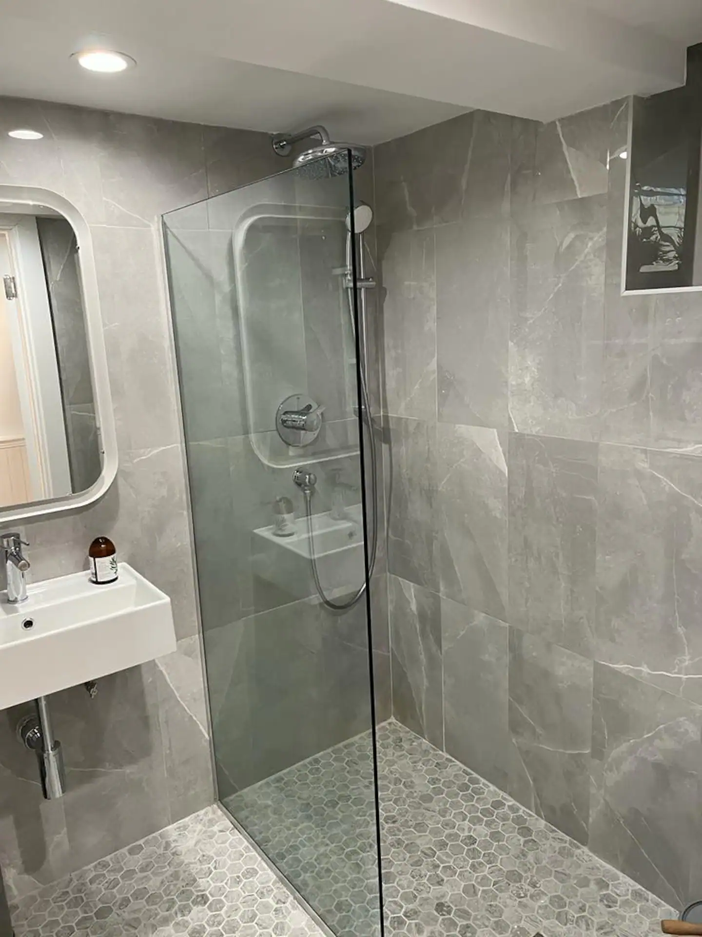 Marble bathroom with rain shower